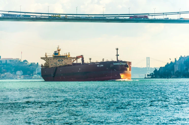 Cargo vessel underway used for noon reports in shipping and voyage monitoring